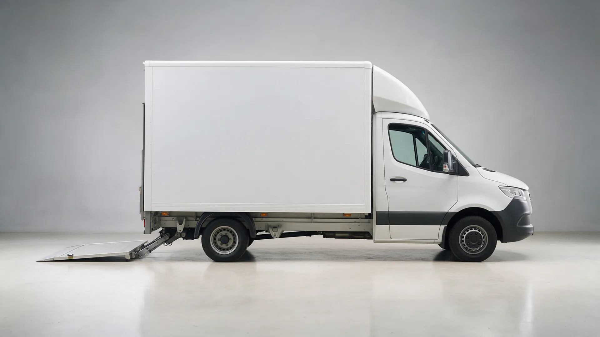 Luton van with tail lift, side view